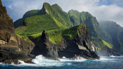 Madeira volcanic sea cliffs and green mountain peaks near Sao Lourenco