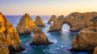 Ponta da Piedade golden limestone rock arches in Lagos Algarve